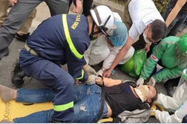 Kịp thời cứu nạn người phụ nữ bị thương, nằm bất động trên đường