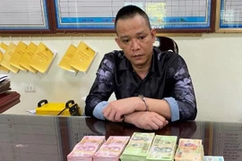 Đang nhận 200 triệu đồng thì bị Công an bắt quả tang