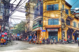 Hồn phố đượm nồng trên từng ô cửa Hà Nội