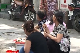 Những nguy cơ tiềm ẩn từ thức ăn đường phố