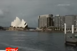 Australia hạ dự báo GDP trong năm tài khóa hiện tại