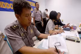 Phát hiện "đống đổ nát" của máy bay QZ8501 dưới đáy biển