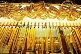 Giá vàng tăng mạnh khi Chính phủ Mỹ có thể sớm mở cửa trở lại