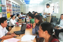 Luật thuế thu nhập cá nhân: Cấp mã số cho cả người phụ thuộc