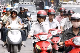 Xe máy sẽ đóng 150.000 đồng phí đường bộ mỗi năm