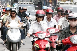 Xe máy sẽ đóng 150.000 đồng phí đường bộ mỗi năm