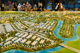 Đánh thuế cao để chống đầu cơ bất động sản 