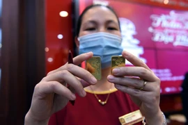 Bị chốt lời, giá vàng quay đầu giảm