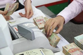 Vì sao Ngân hàng Nhà nước không bỏ “room” tín dụng?