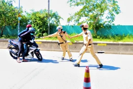 Khởi tố bị can đối tượng điều khiển xe máy đâm bị thương Cảnh sát giao thông đang làm nhiệm vụ