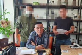 Bắt quả tang đối tượng cưỡng đoạt tài sản của doanh nghiệp