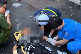 Bàng hoàng nam thanh niên bị tai nạn văng qua thành cầu Chương Dương