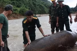 Bom mìn vẫn rải rác khắp nơi 
