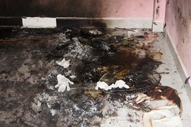 Vợ tưới xăng đốt chồng trong đêm đầu năm mới