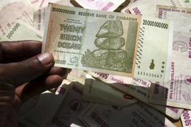 Cạn tiền mặt, Zimbabwe sắp in phiên bản đồng USD