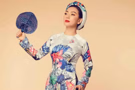 Rũ bỏ hình ảnh sexy, "nữ hoàng ảnh lịch" Y Phụng đài các với áo dài