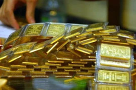 Lực cầu “bắt đáy” giúp giá vàng dừng đà giảm