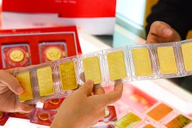 Giá vàng thế giới lao dốc, Ngân hàng Nhà nước giảm giá bán vàng SJC