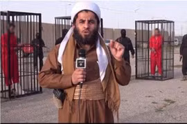 IS nhốt 21 chiến binh trong lồng sắt diễu phố