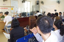 Thực hiện việc thu lệ phí CMND mới 