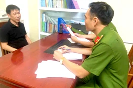 Khởi tố nhóm đối tượng đưa hối lộ cho kiểm lâm để buôn lậu gỗ từ Lào về Việt Nam