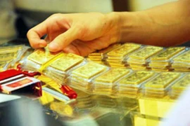 Vàng, USD tăng giá như thế nào trong năm qua?