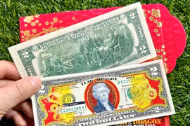 Mua tiền lì xì in hình rồng dát vàng: Thận trọng kẻo vớ quả đắng