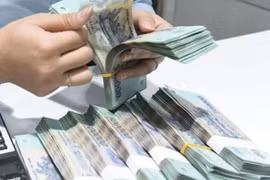 Không phải trả nợ thay cho chồng nếu tiền vay không vì mục đích gia đình 