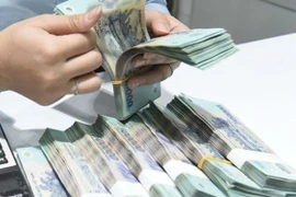 Không phải trả nợ thay cho chồng nếu tiền vay không vì mục đích gia đình 