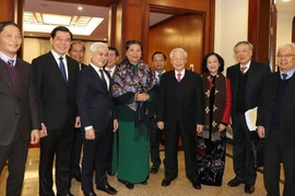 Tổng Bí thư - Chủ tịch nước Nguyễn Phú Trọng với các đồng chí lãnh đạo Đảng, Nhà nước và các đại biểu dự phiên bế mạc Hội nghị lần thứ 14 Ban Chấp hành Trung ương Đảng khóa XII, ngày 18-12-2020