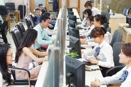 Dù thừa vốn, ngân hàng vẫn phải “nhìn mặt khách” để… cho vay