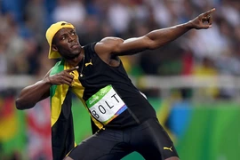 "Tia chớp" Usain Bolt đi vào lịch sử Olympic