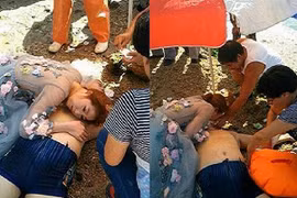 Nữ y tá bỏ chụp ảnh cưới để cứu người đau tim đuối nước