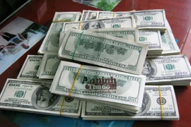 Tên cướp 147 ngàn USD bị CSGT tóm vì không đội mũ bảo hiểm