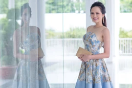 Hoa hậu Diệu Linh diện váy trẻ trung như nữ sinh đi họp báo