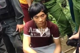 Tẩn Láo Lở- nghi can vụ thảm án ở Lào Cai được đưa về thực nghiệm hiện trường