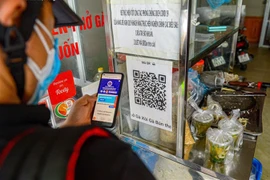 Quét mã QR: Nơi nghiêm túc, chỗ thờ ơ