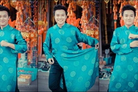 "Én đồng" Thành Trung diện áo dài xuống phố đón Xuân