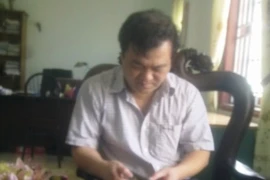 Phóng viên bị Trưởng ban quản lý dự án “tịch thu” máy ảnh khi tác nghiệp