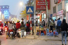 Bắt đối tượng đe doạ người bán nước để lấy tiền