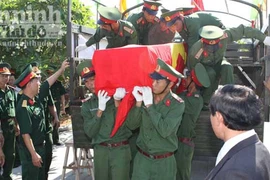An táng 32 hài cốt liệt sĩ hy sinh tại Lào