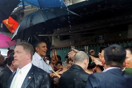 Buổi chiều bận rộn của ông Obama ở TP.HCM