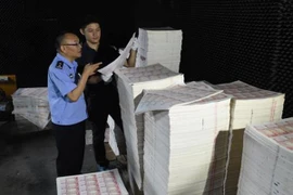 Trung Quốc triệt phá đường dây tiền giả chấn động Quảng Đông