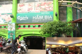 Tầng hầm thành quán ăn, xe tràn ra hè phố