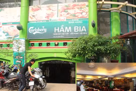 Tầng hầm thành quán ăn, xe tràn ra hè phố