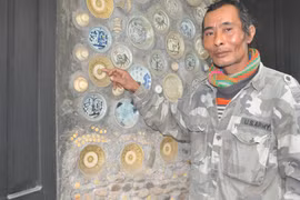 Lão nông nghèo cắm sổ đỏ mua 9.000 đồ cổ gắn lên tường nhà