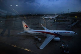 Máy bay Malaysia Airlines suýt va chạm 