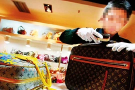 Dịch vụ tân trang hàng hiệu: Phập phù về chất lượng, giá cả