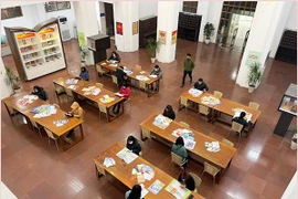 Trưng bày tư liệu - Báo Xuân Nhâm Dần 2022 với chủ đề "Đảng và mùa xuân đất nước"