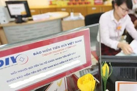Thu hơn 12.300 tỷ đồng phí, Bảo hiểm tiền gửi Việt Nam đang sử dụng tiền ra sao?